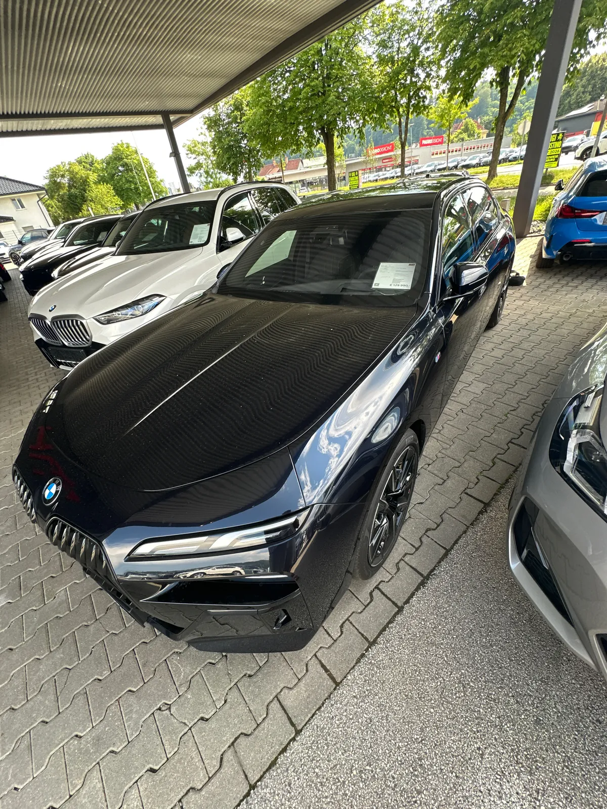 BMW 740d at the dealer during a FEWD inspection